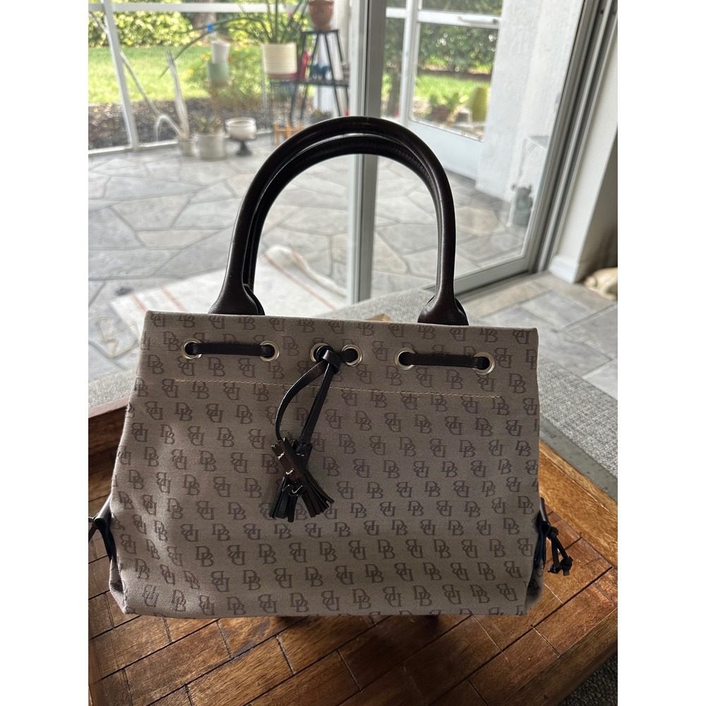 Dooney & Bourke Monogram‎ Canvas Tote Bag Brown Leather Trim Tassel Accent